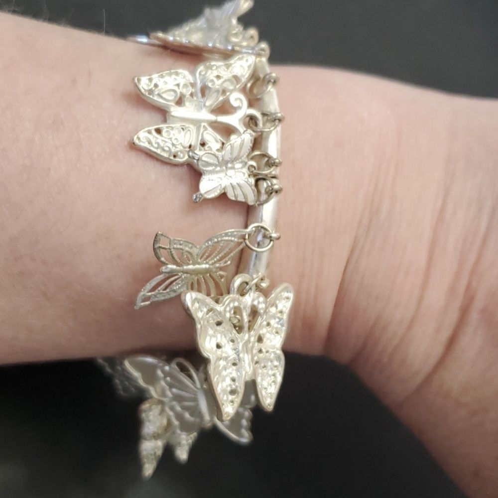 Silver tone butterfly charm bracelet 7"